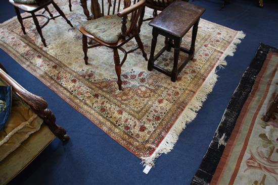 An Isphahan style silk carpet, 9ft 3in by 6ft 4in.
